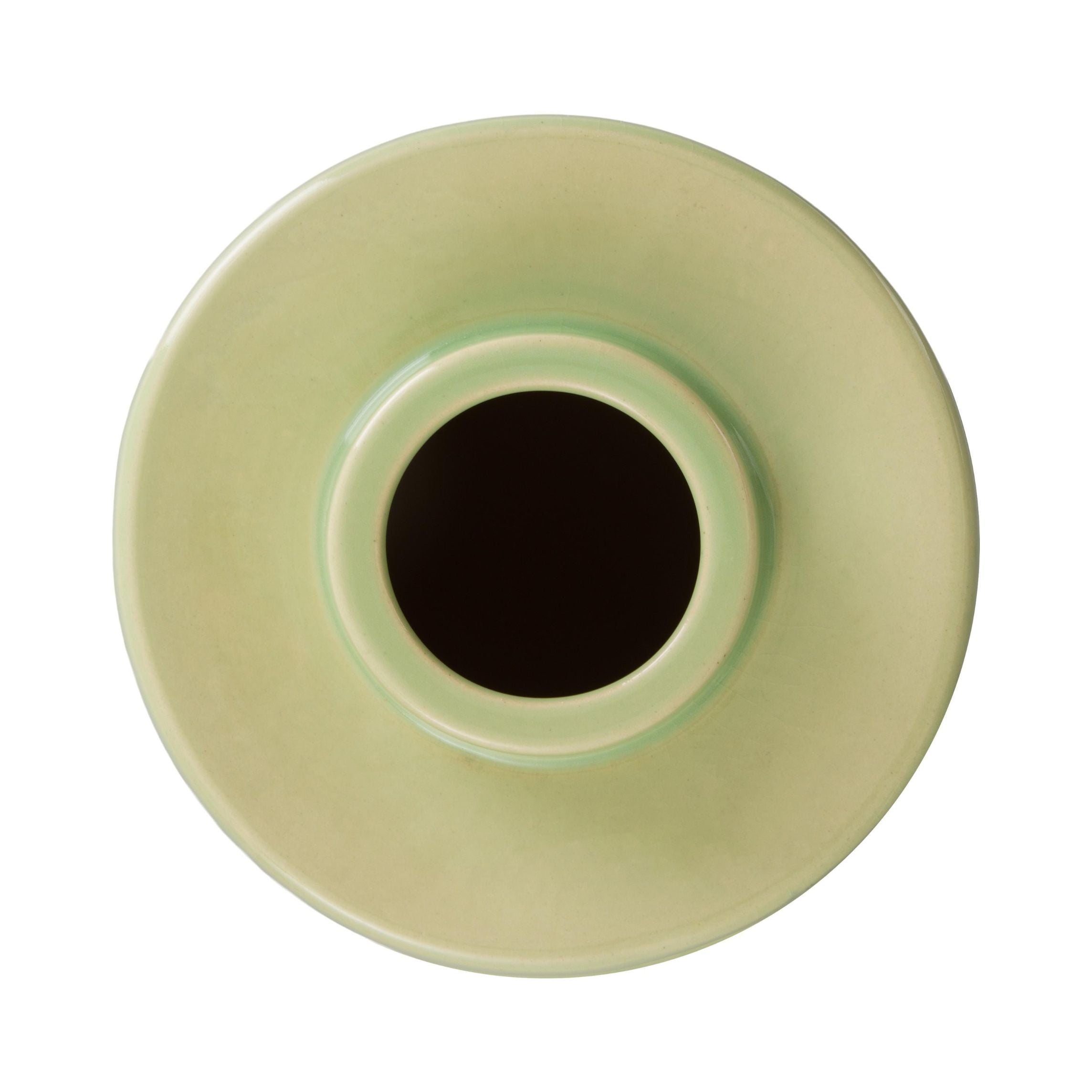 Top view of a light green ceramic vase with a central black circle on a white background