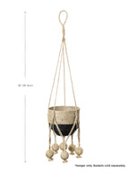 Nautical rope hanger with decorative balls on a white background