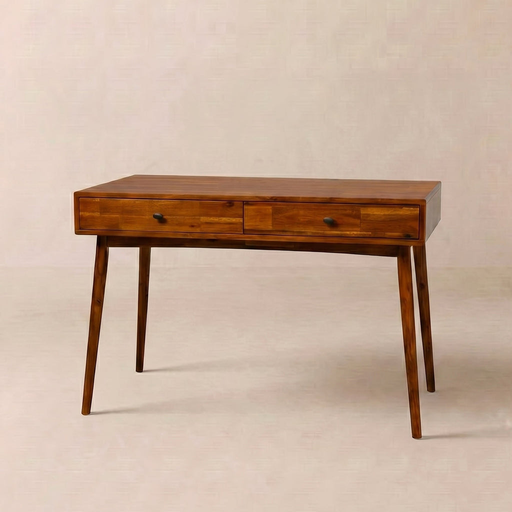 Wooden desk with two drawers on a plain background