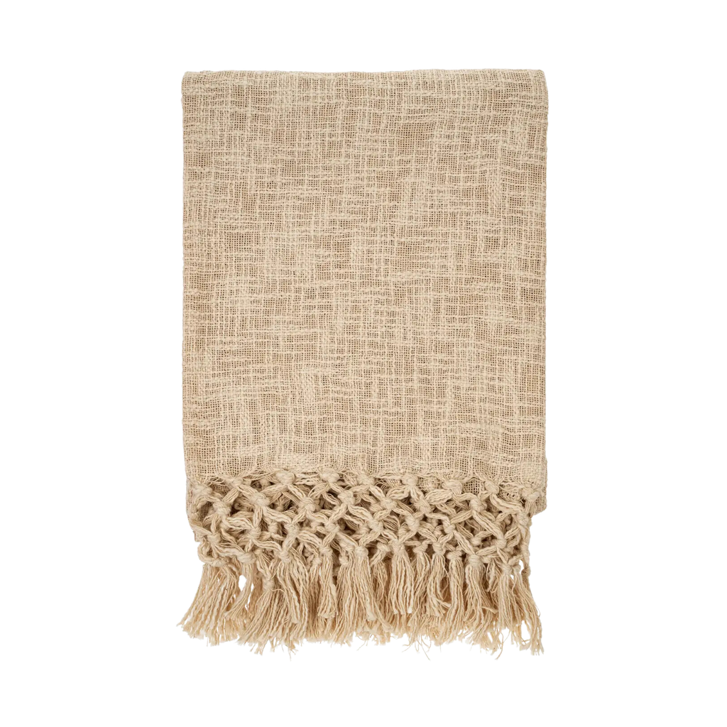 Beige woven blanket with fringe on a white background