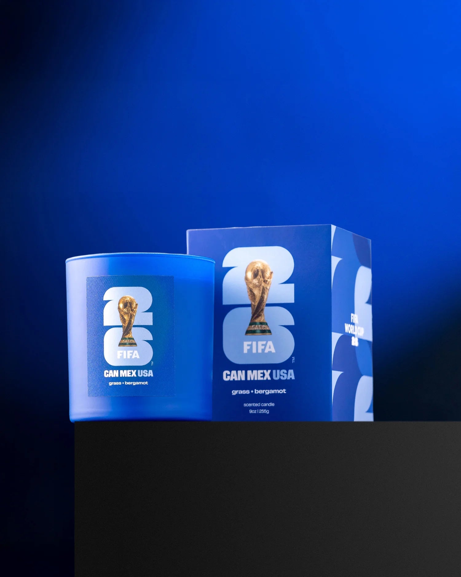 Blue cylindrical container and box with FIFA logo on a blue background