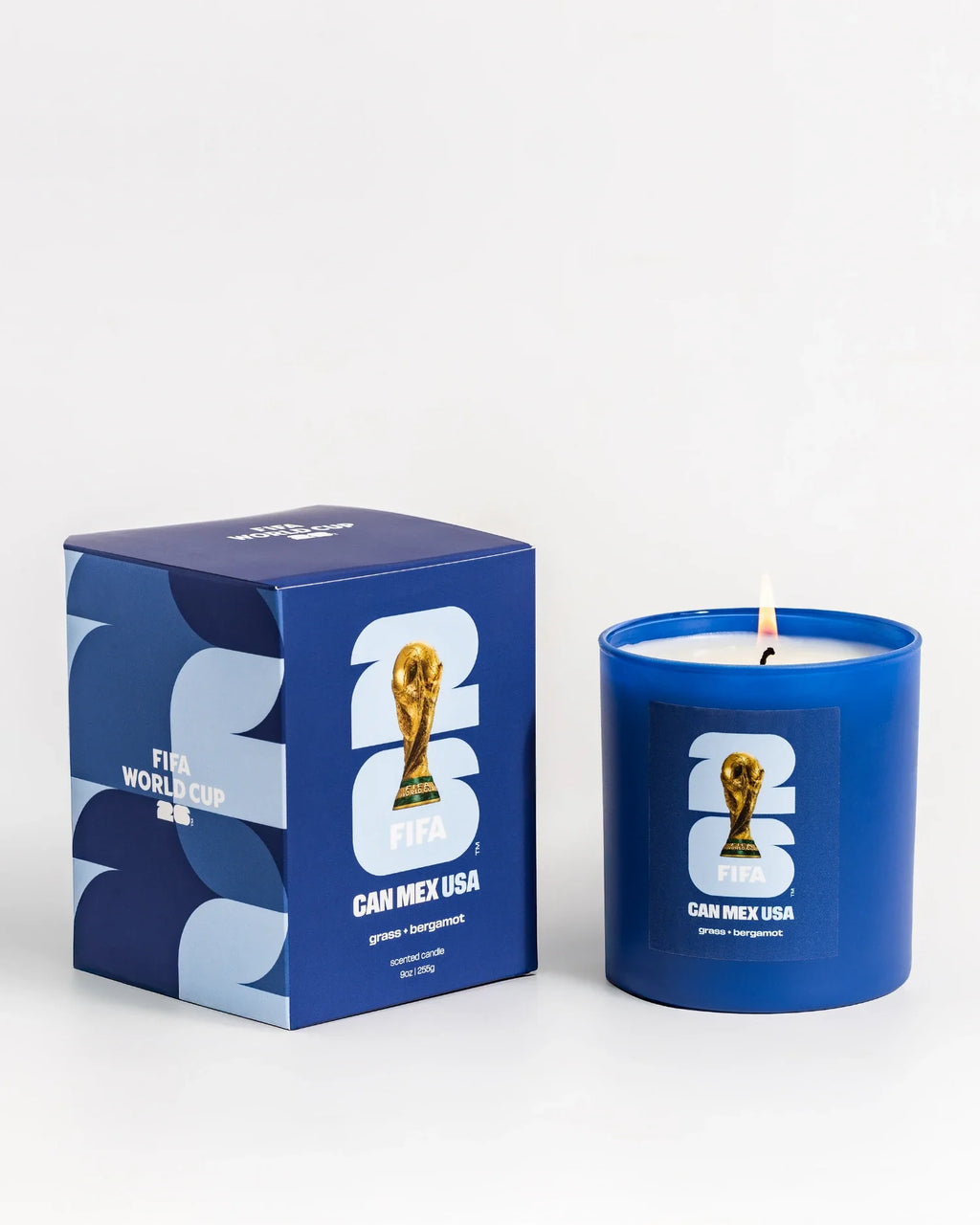 Blue candle and packaging with FIFA World Cup branding on a white background