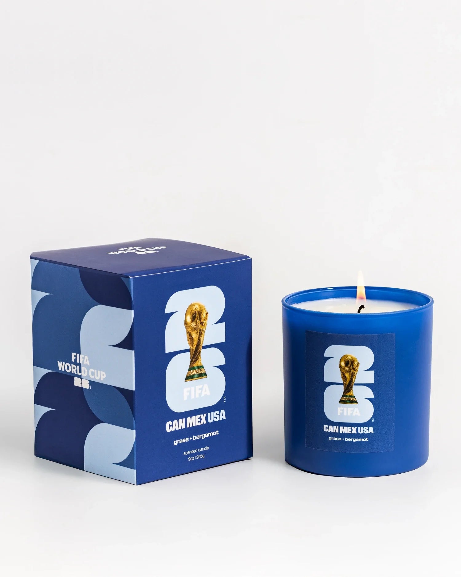 Blue candle and packaging with FIFA World Cup branding on a white background