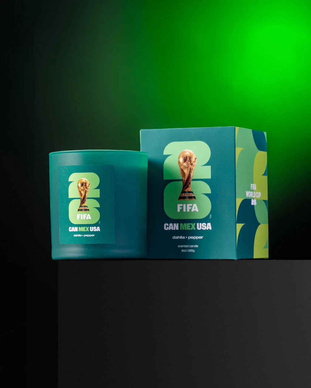 FIFA-themed candle and packaging on a dark background with green lighting