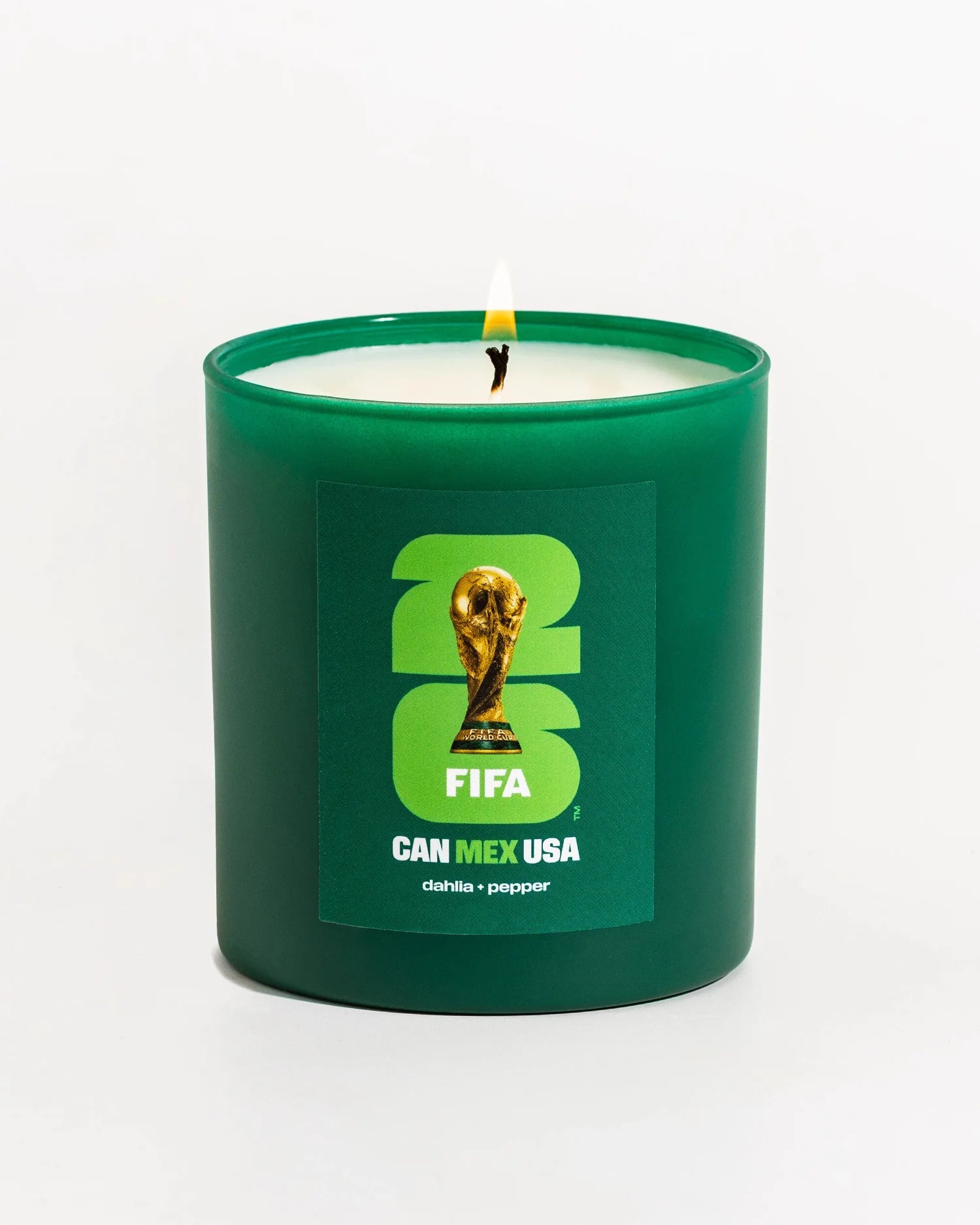 Green candle with FIFA World Cup branding on a white background