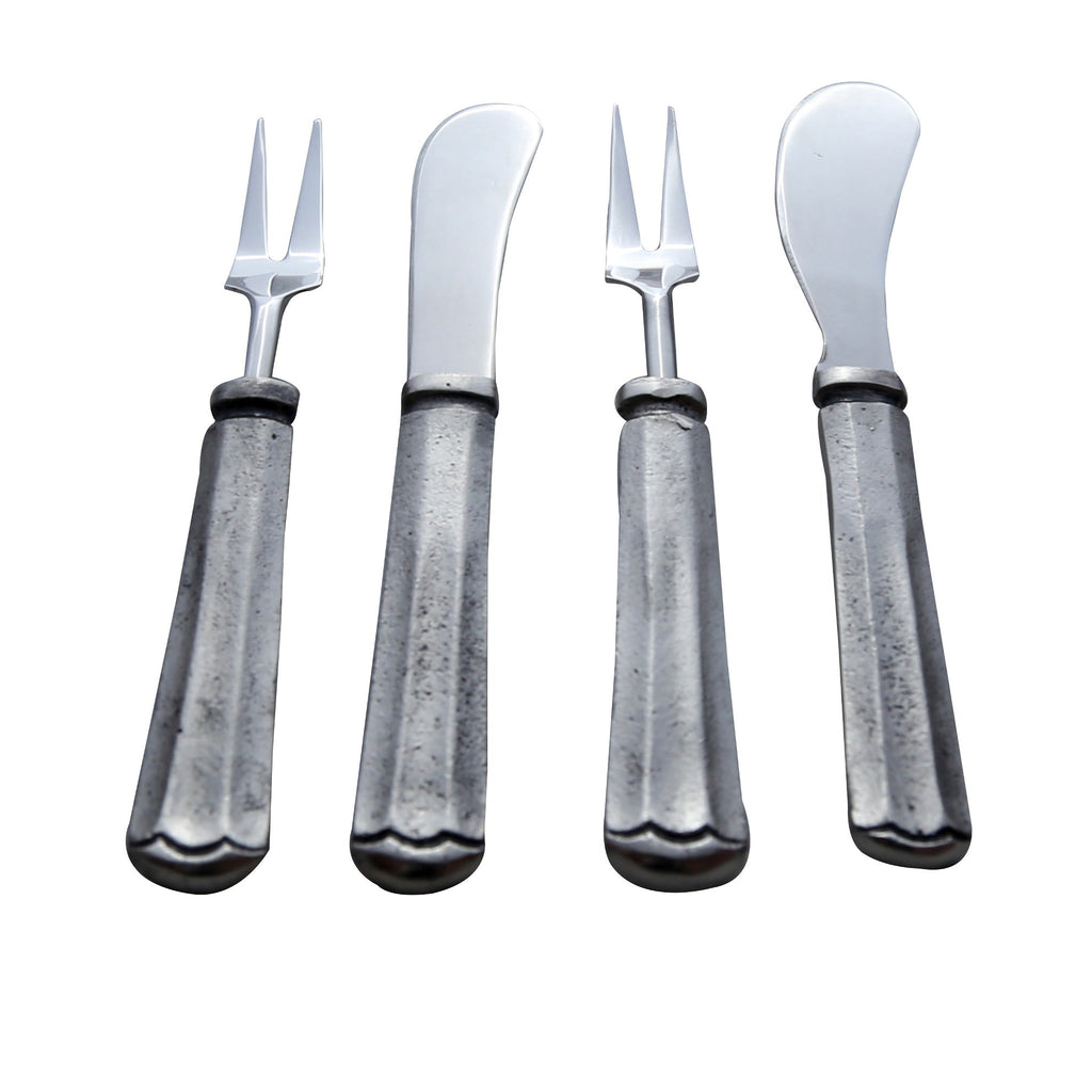 Ensemble 4 pièces de tartineur et fourchette à fromage antique Maharaja en argent.
