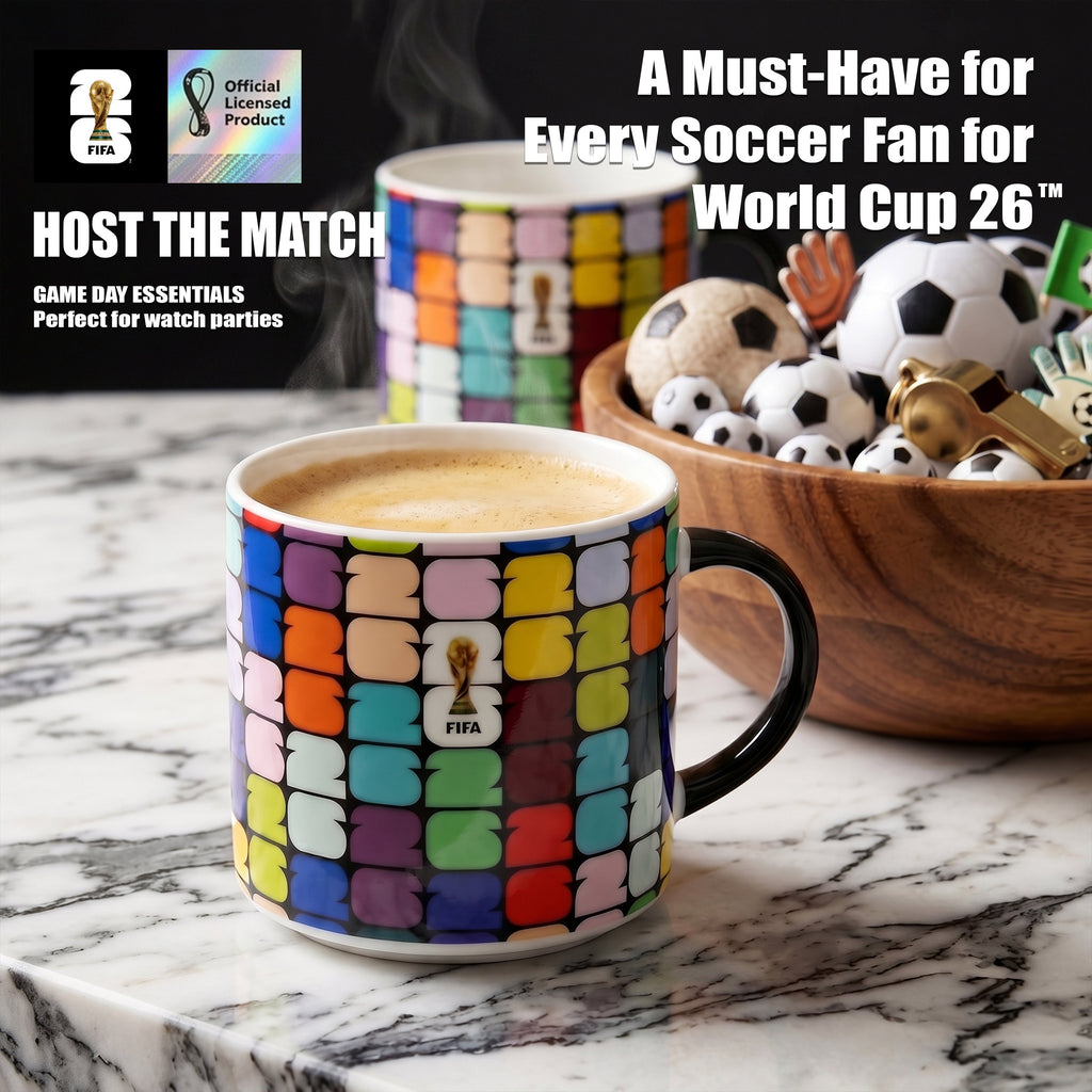 Colorful mug with soccer-themed decor on a marble surface
