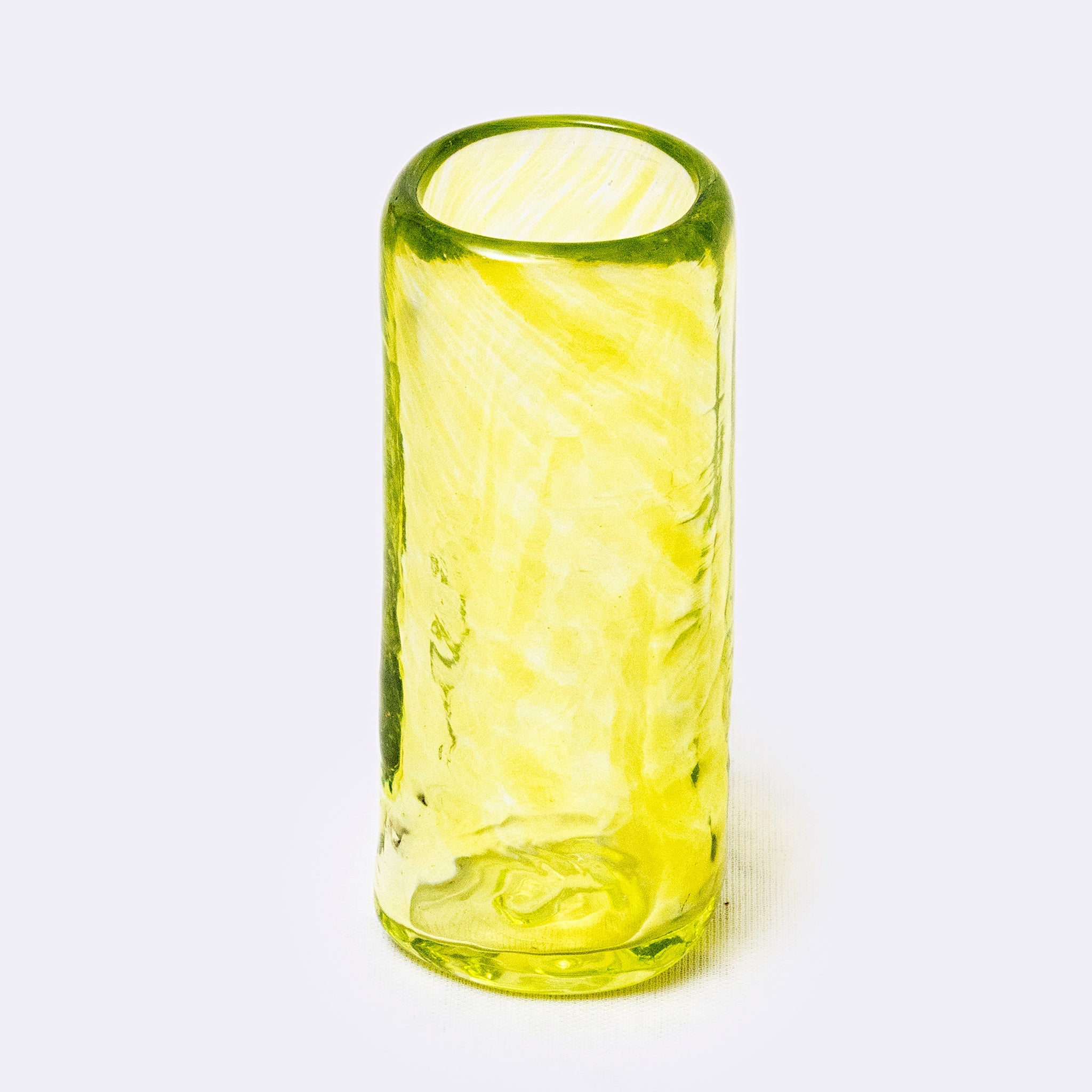 Green textured glass on a white background