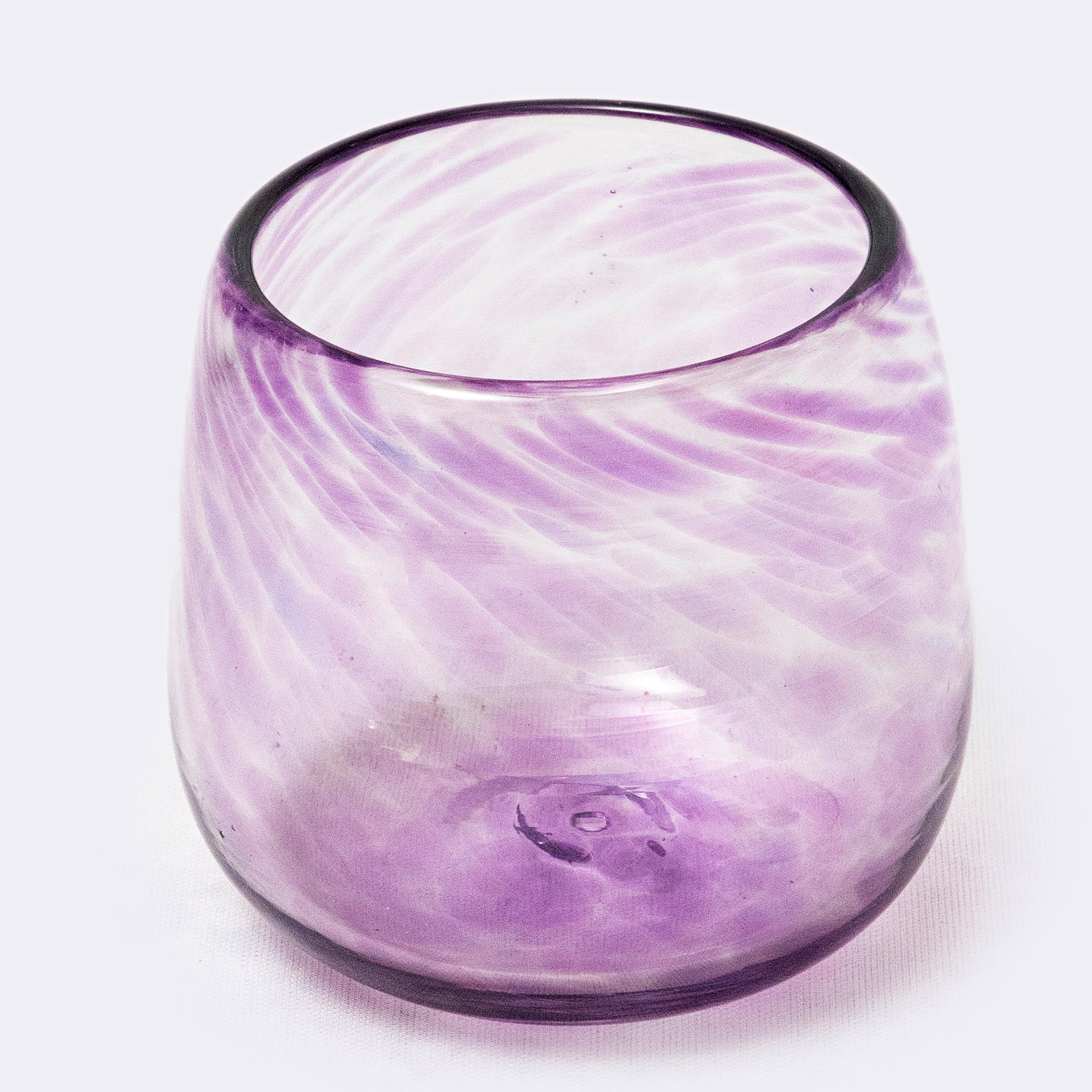 Purple glass vase with swirling pattern on a white background