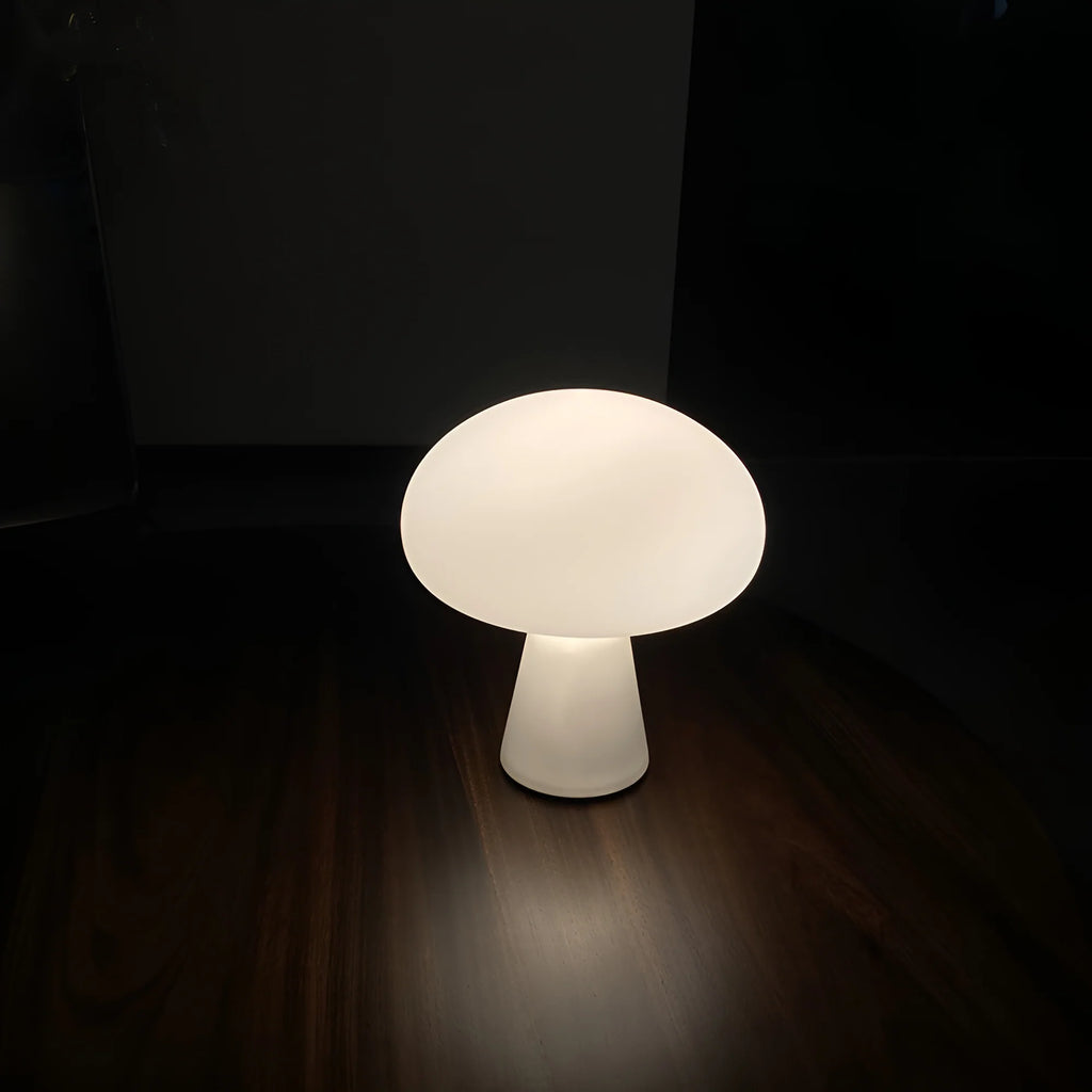Mushroom-shaped lamp emitting light on a dark background