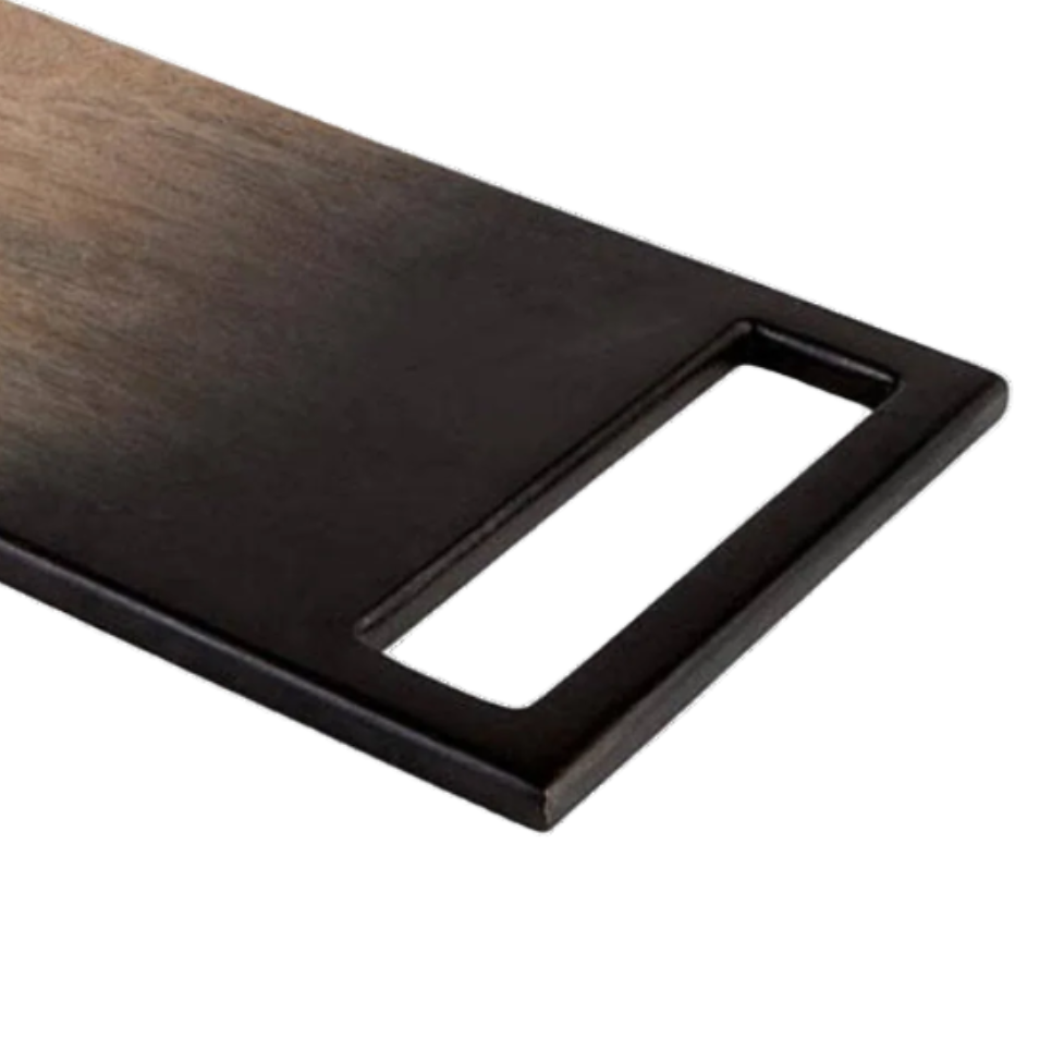 Dark brown wooden cutting board with a black handle on a white background