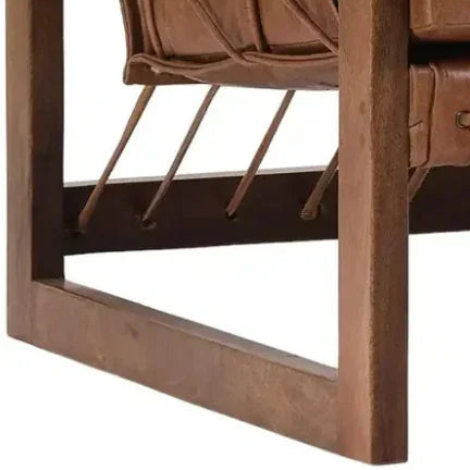 Close-up of a brown leather chair with wooden frame on a white background