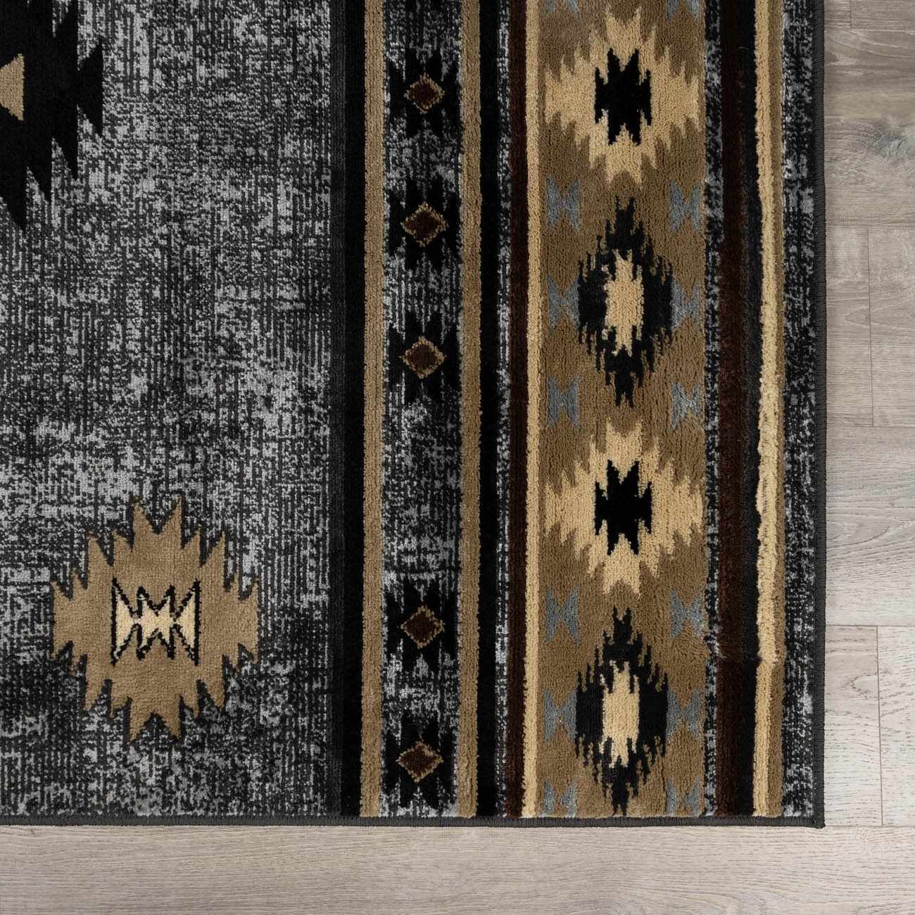 Patterned rug with geometric designs on a wooden floor