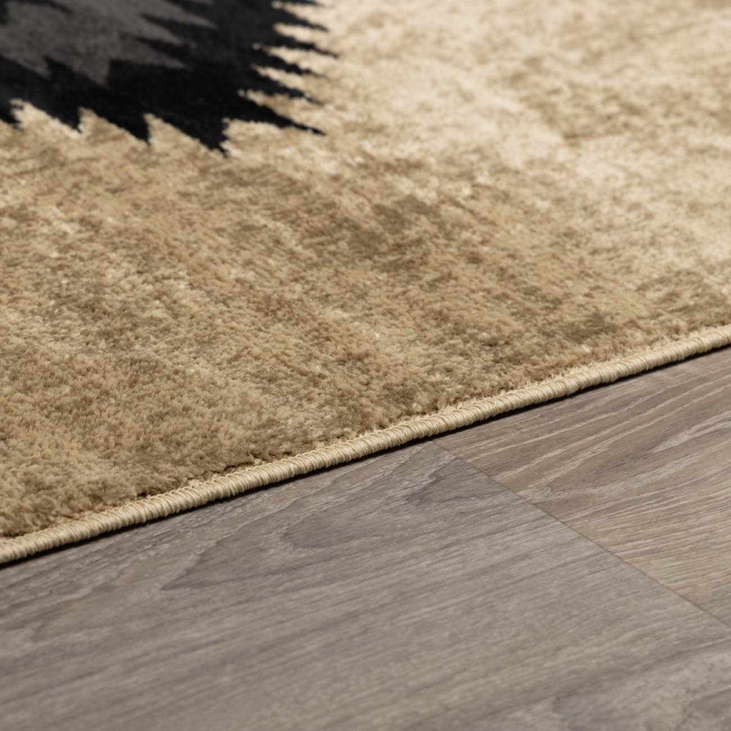 Beige rug on a wooden floor
