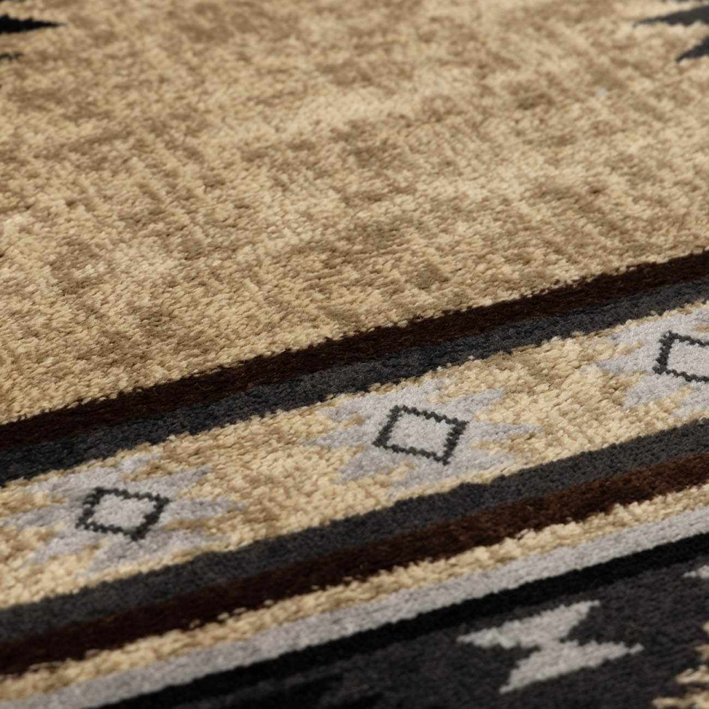 Close-up of a textured rug with geometric patterns