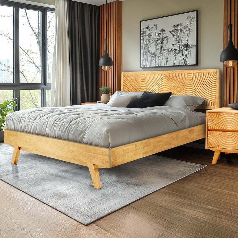 Wooden bed with gray bedding in a modern bedroom setting