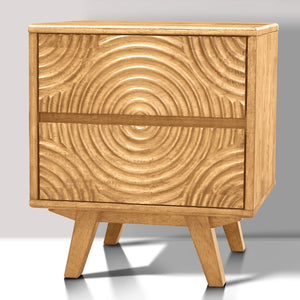 Wooden nightstand with a patterned design on a gray background
