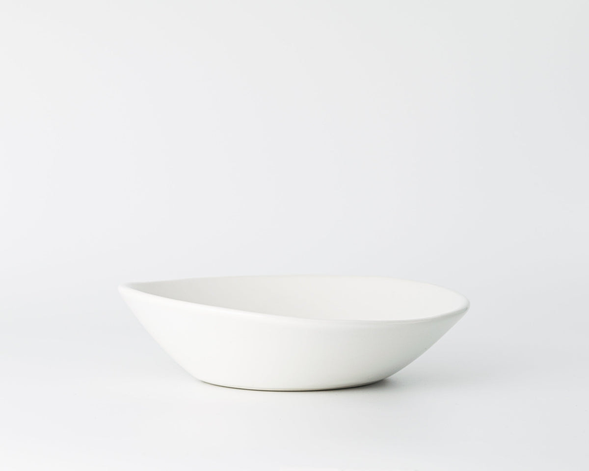 White ceramic bowl on a white background