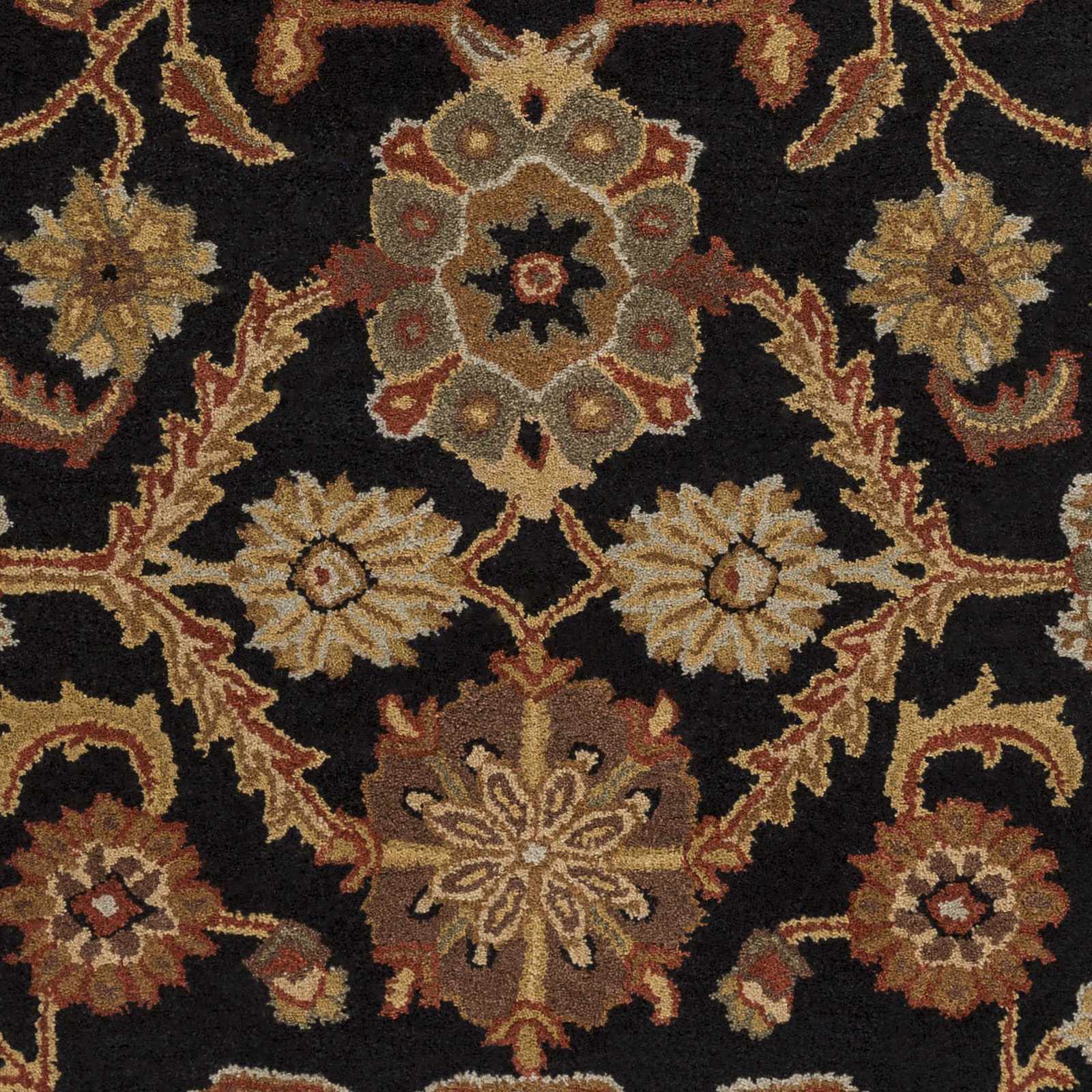 Close-up of an ornate floral patterned rug with intricate details on a dark background.