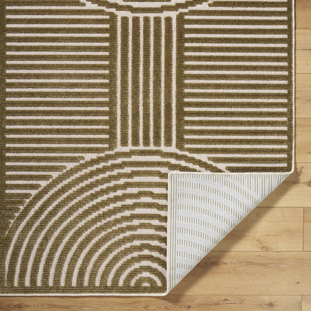 Patterned rug with geometric design on a wooden floor