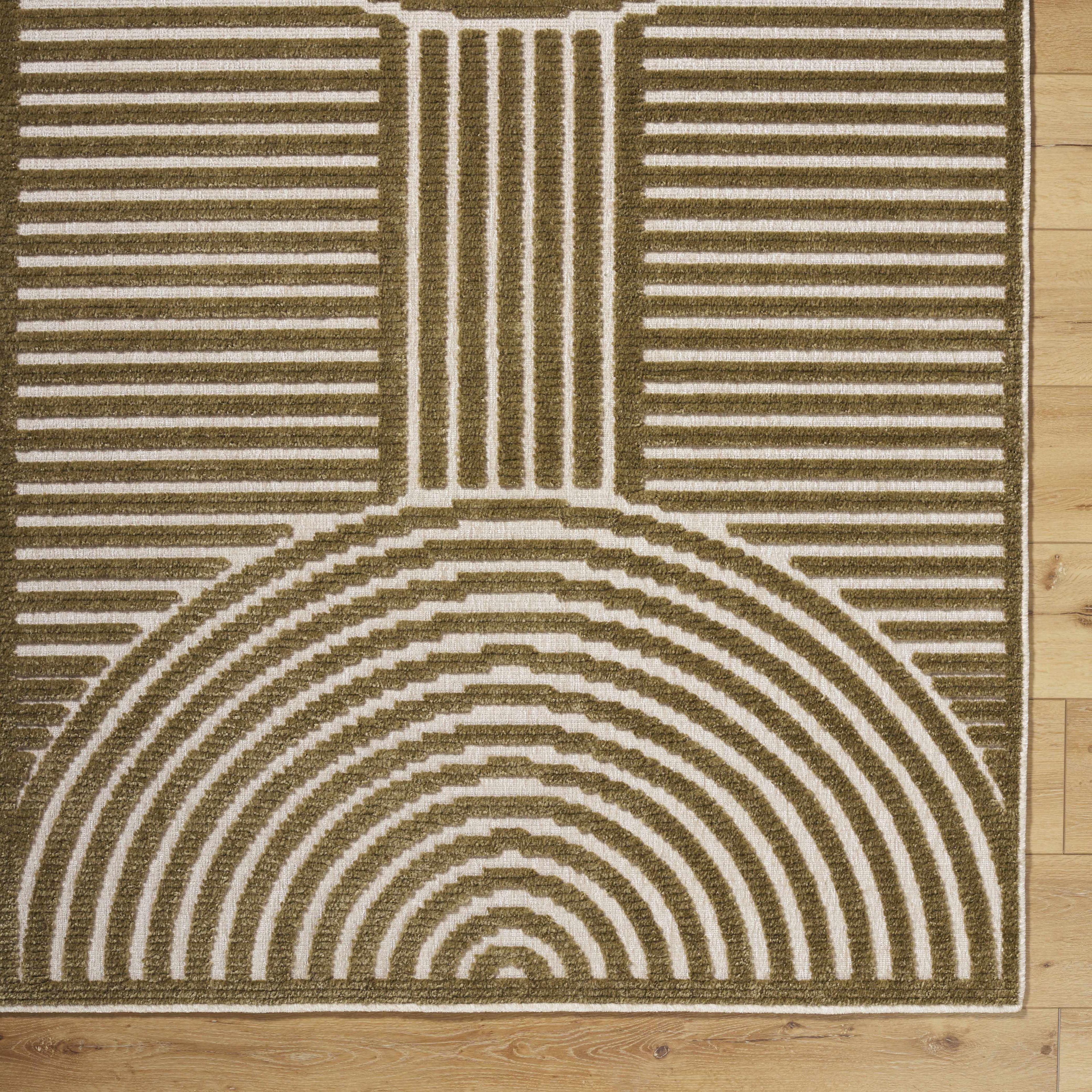 Rug with geometric pattern on a wooden floor