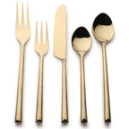 Set of gold-plated cutlery including two forks, a knife, and two spoons on a white background.