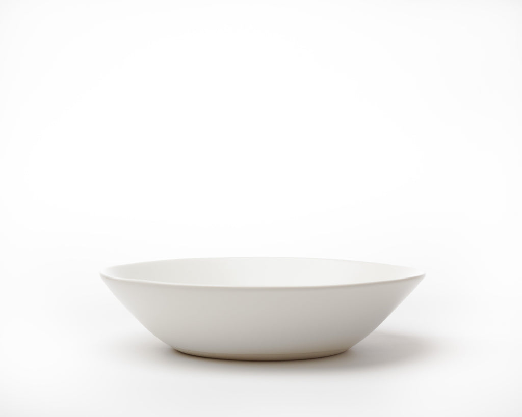 White ceramic bowl on a white background