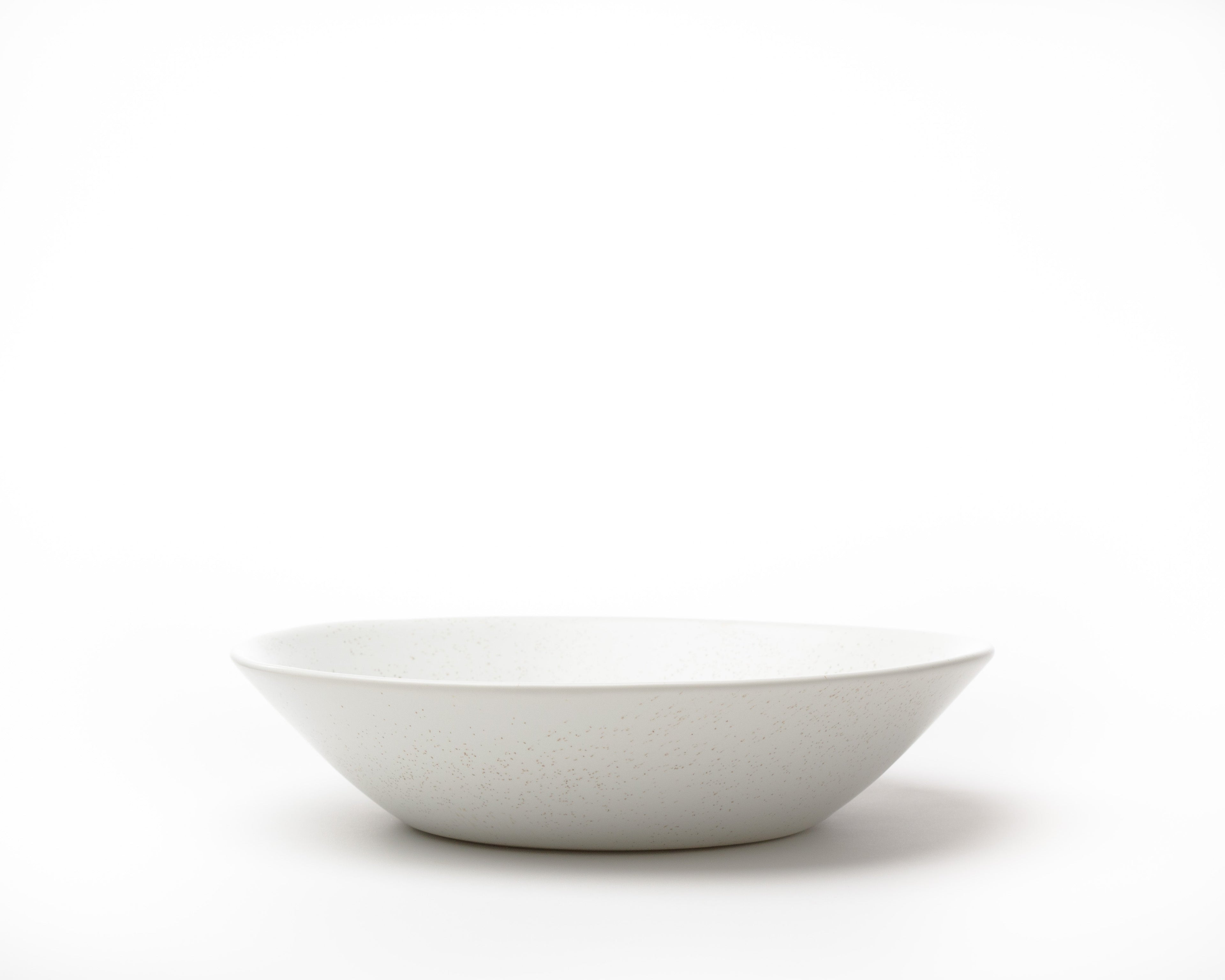 White ceramic bowl on a white background