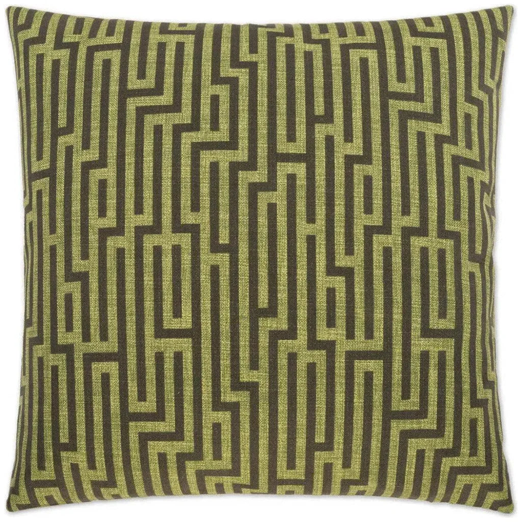 Decorative pillow with geometric green pattern on a white background