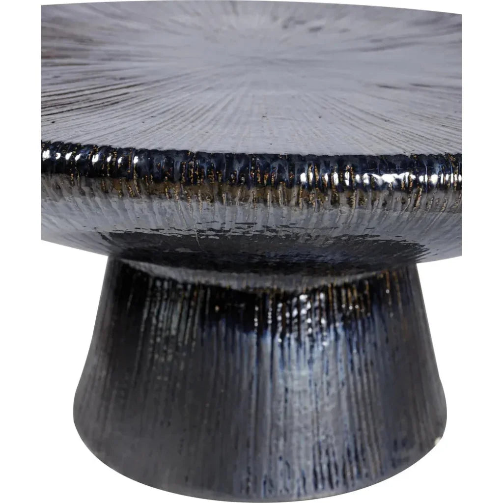 Decorative coffee table with textured design on a white background