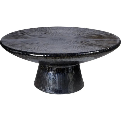 Black textured round table on a white background