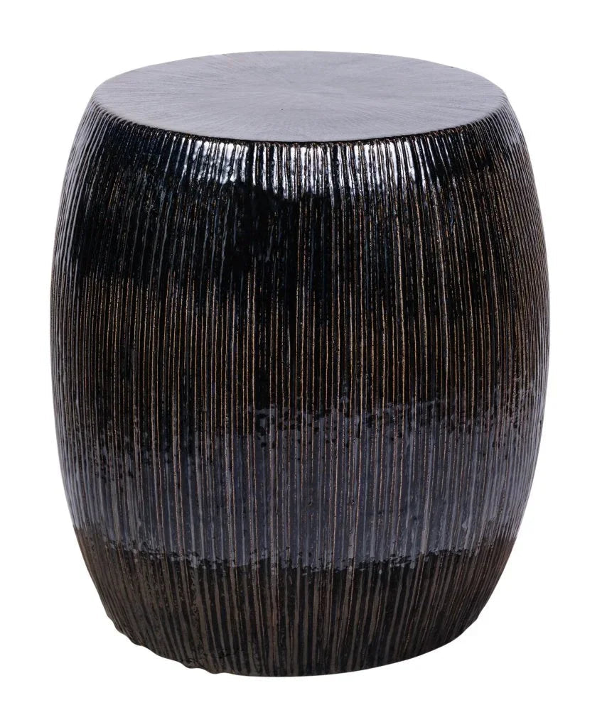 Decorative cylindrical stool with ribbed texture on a white background