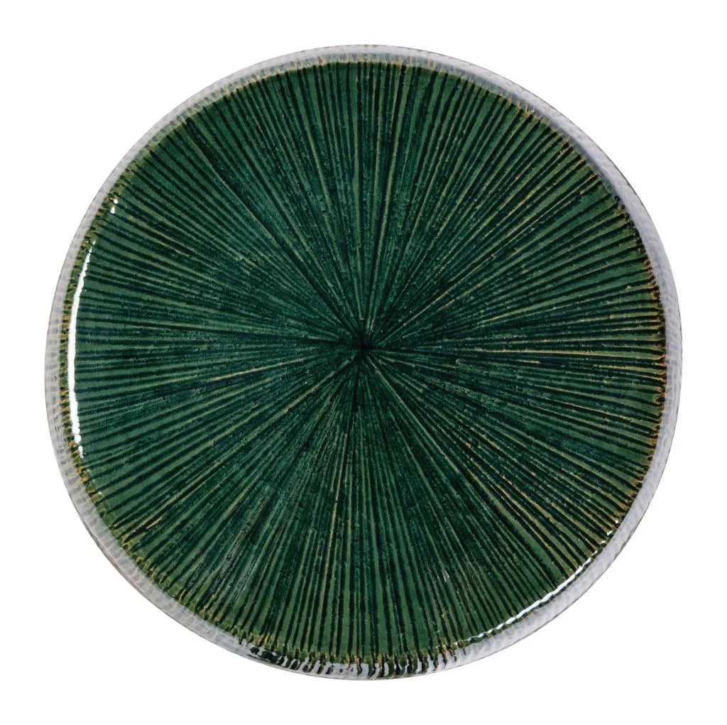 Round green stool top plate with textured line pattern on a white background