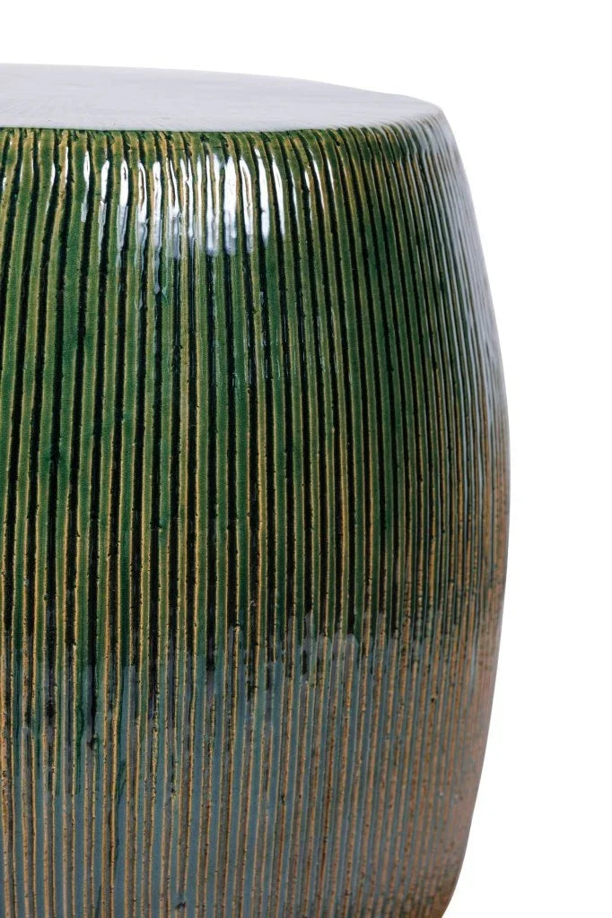 Cylindrical ceramic stool with ribbed texture and greenish-brown color on a white background