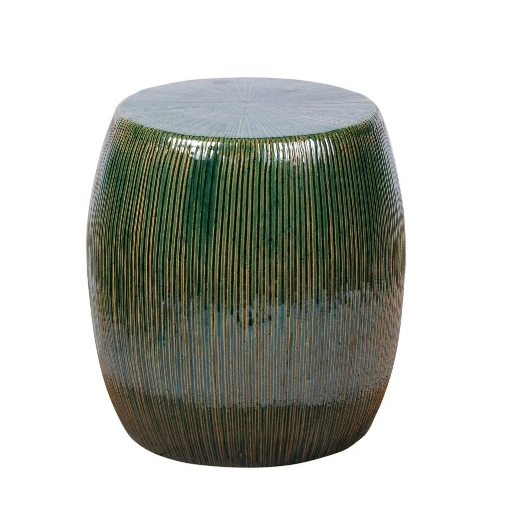 Decorative stool with ribbed design on a white background
