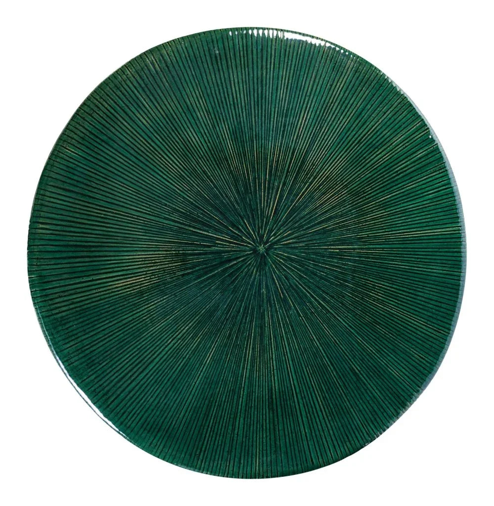 Green circular tabletop on a white background