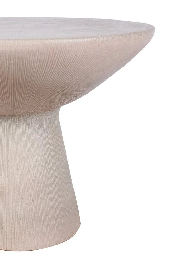 Beige textured accent table with a white top on a white background