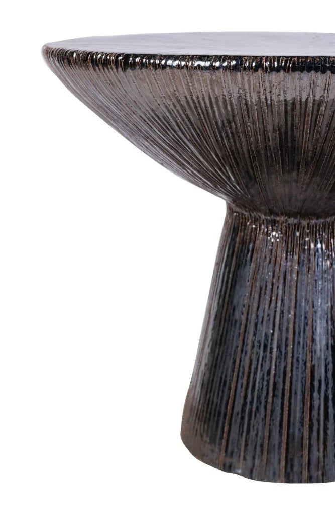 Decorative table with a textured surface on a white background