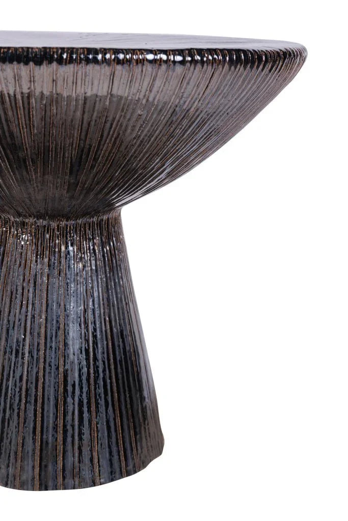 Decorative table with a textured surface on a white background