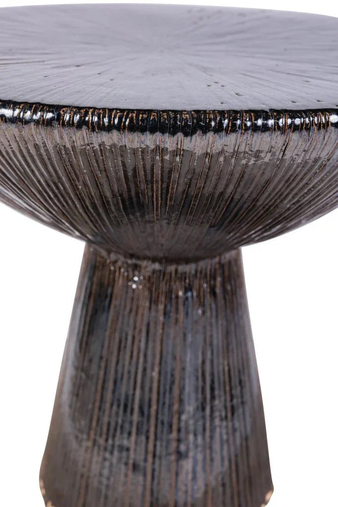 Close-up of a textured ceramic table with ribbed design