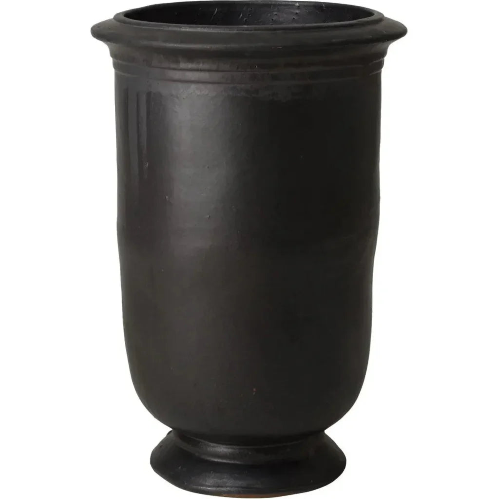 Black urn-shaped planter on a white background