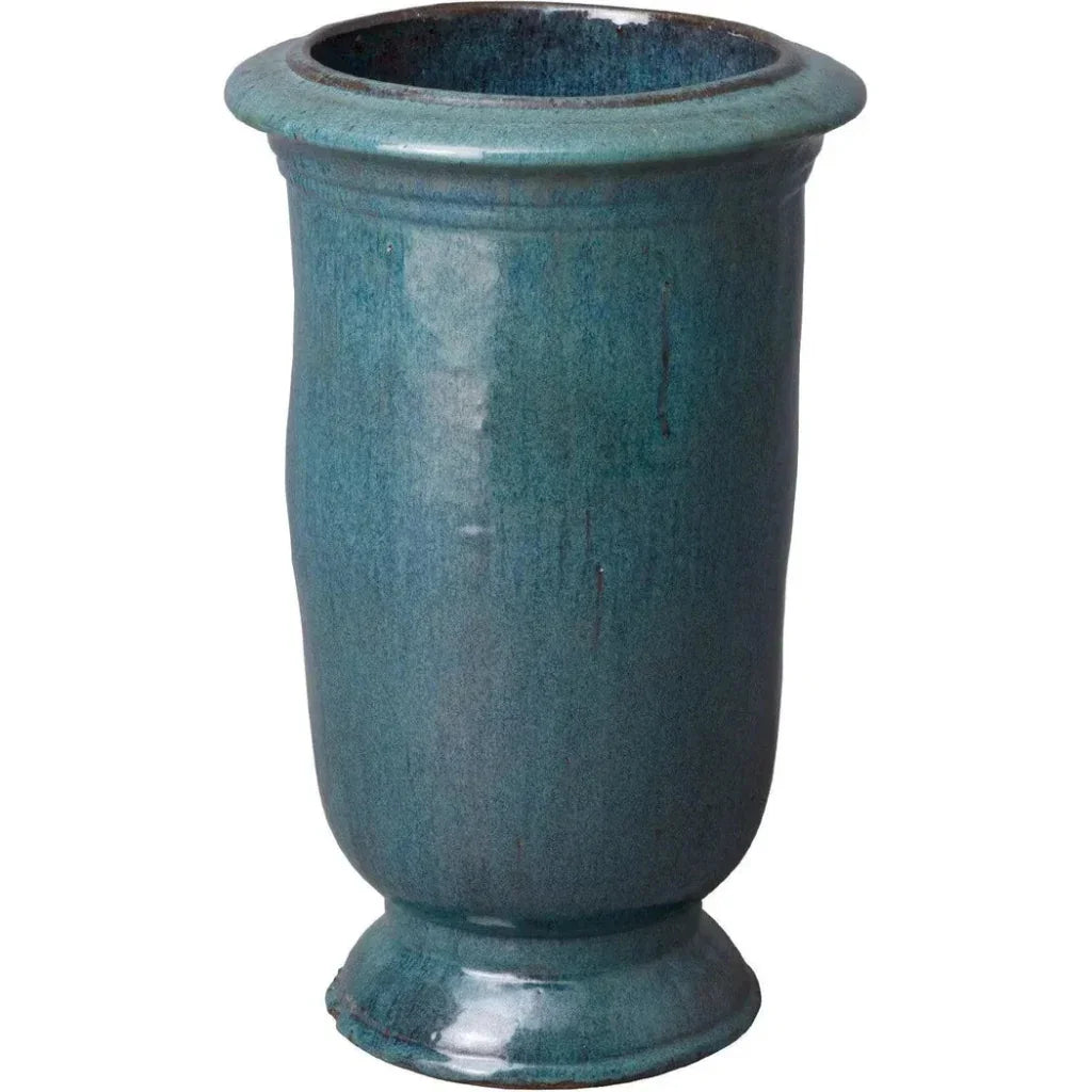 Blue ceramic planter on a white background