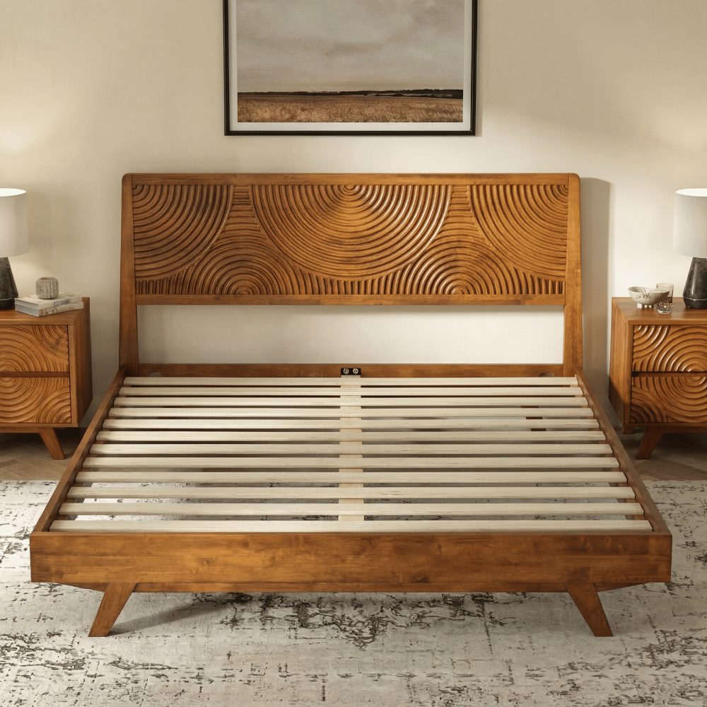 Wooden bed with intricate headboard design in a bedroom setting.