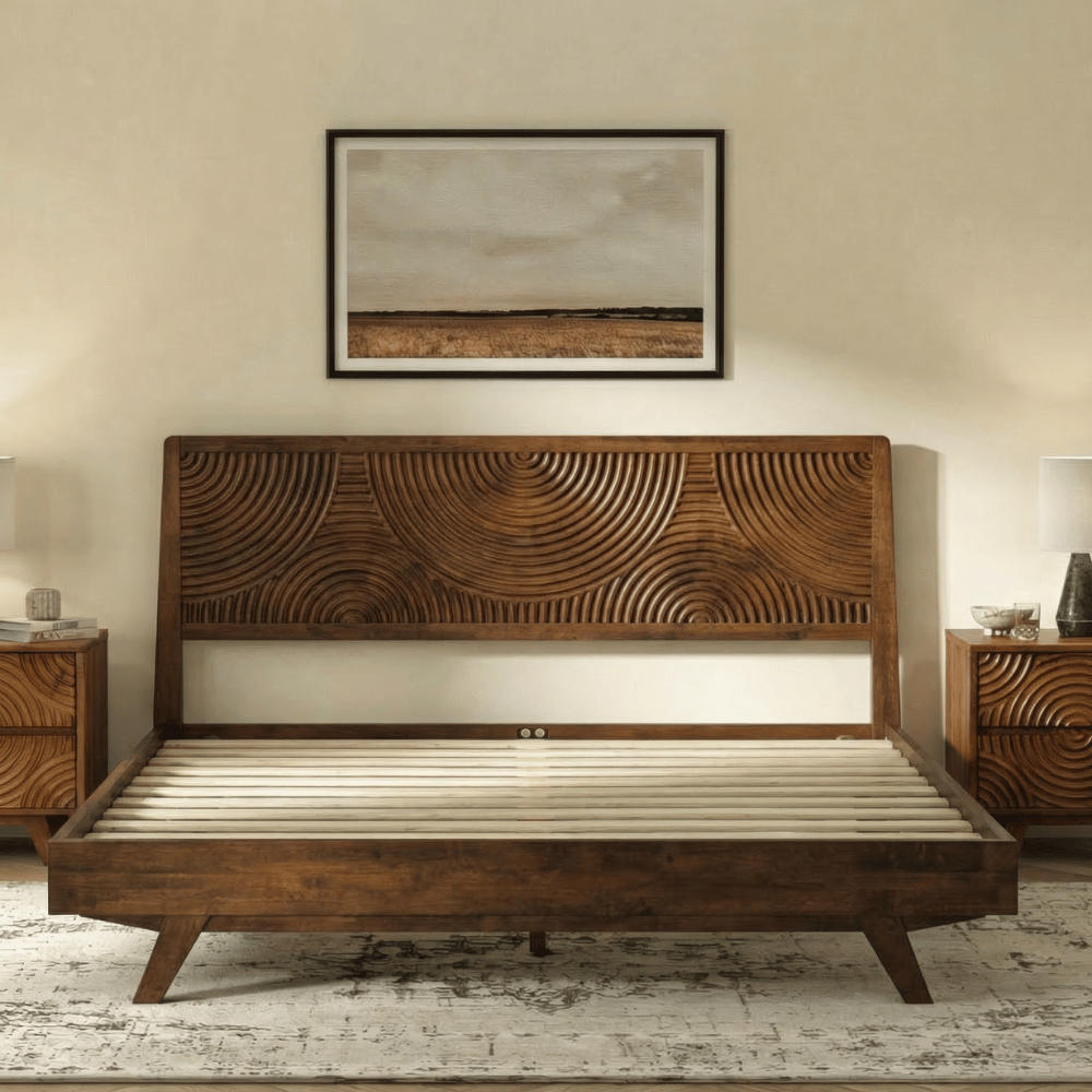 Wooden bed with intricate design in a bedroom setting