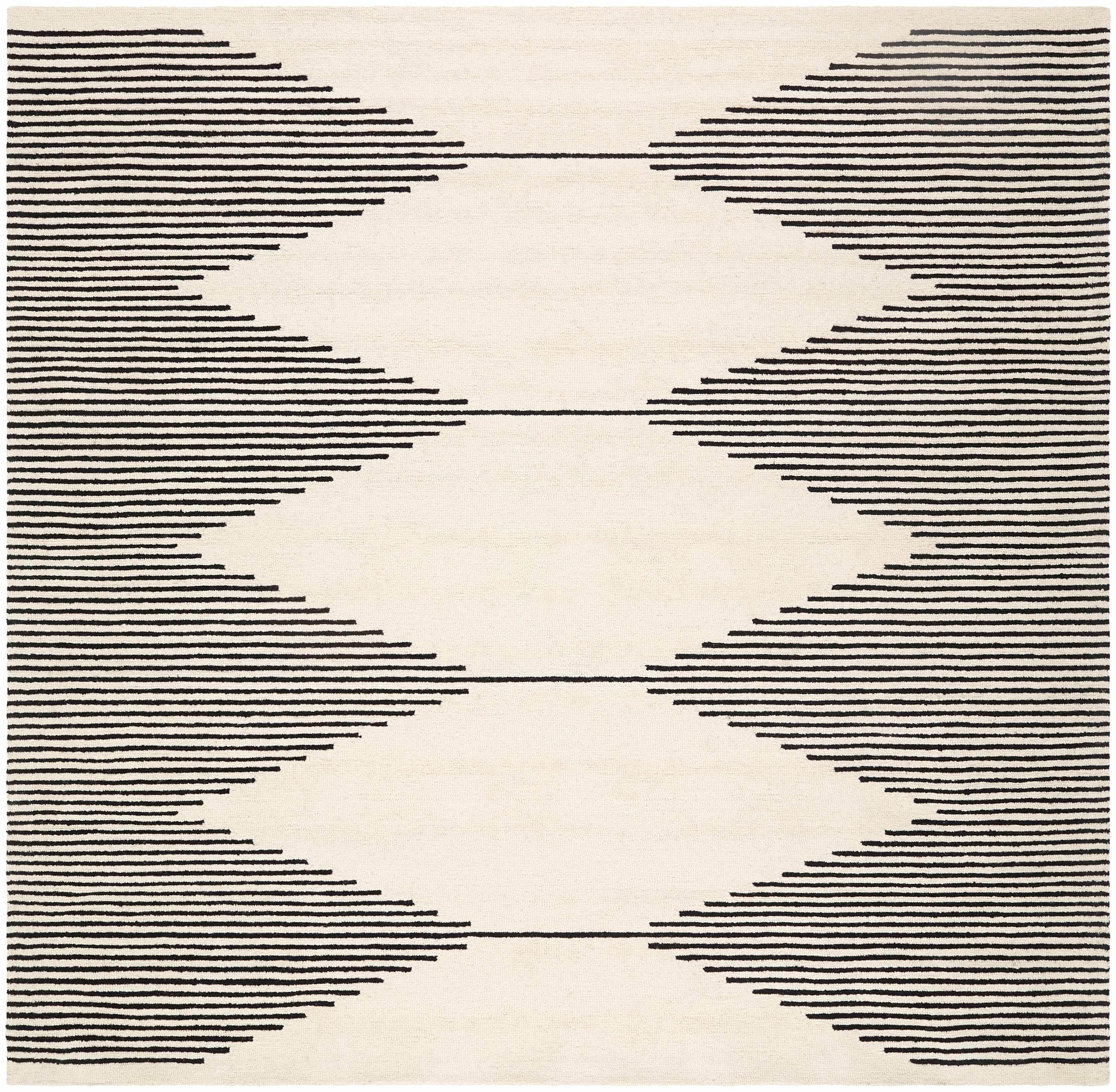 Rug with black geometric pattern on a white background