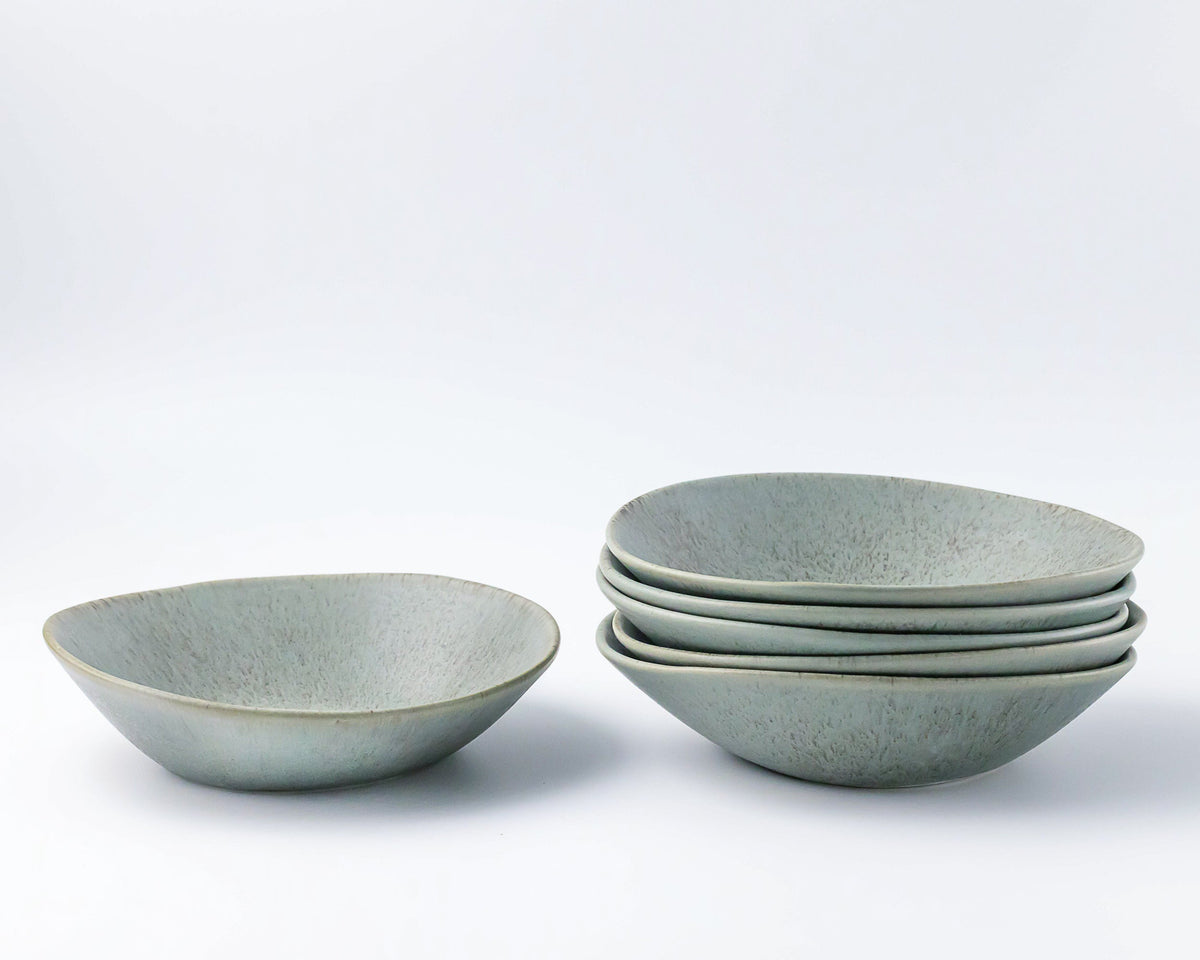 Set of ceramic bowls on a white background