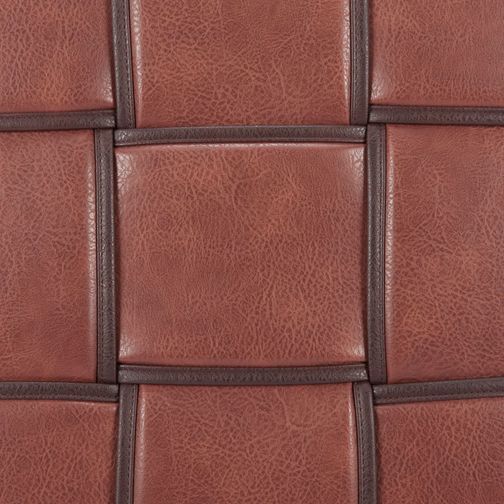 Close-up of brown leather tiles with visible stitching