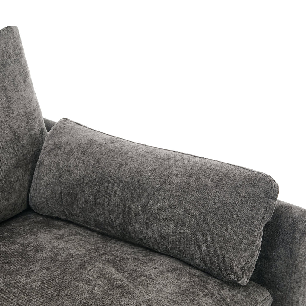 Gray fabric sofa with a close-up of a cushion on a white background