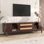 Wooden TV stand with a television mounted on a wall in a living room setting.