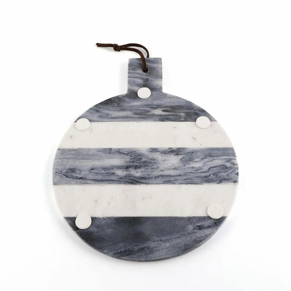 Round marble serving board with gray and white horizontal stripes, featuring a handle with a dark brown hanging cord and four white circular accents, shown on a plain white background.
